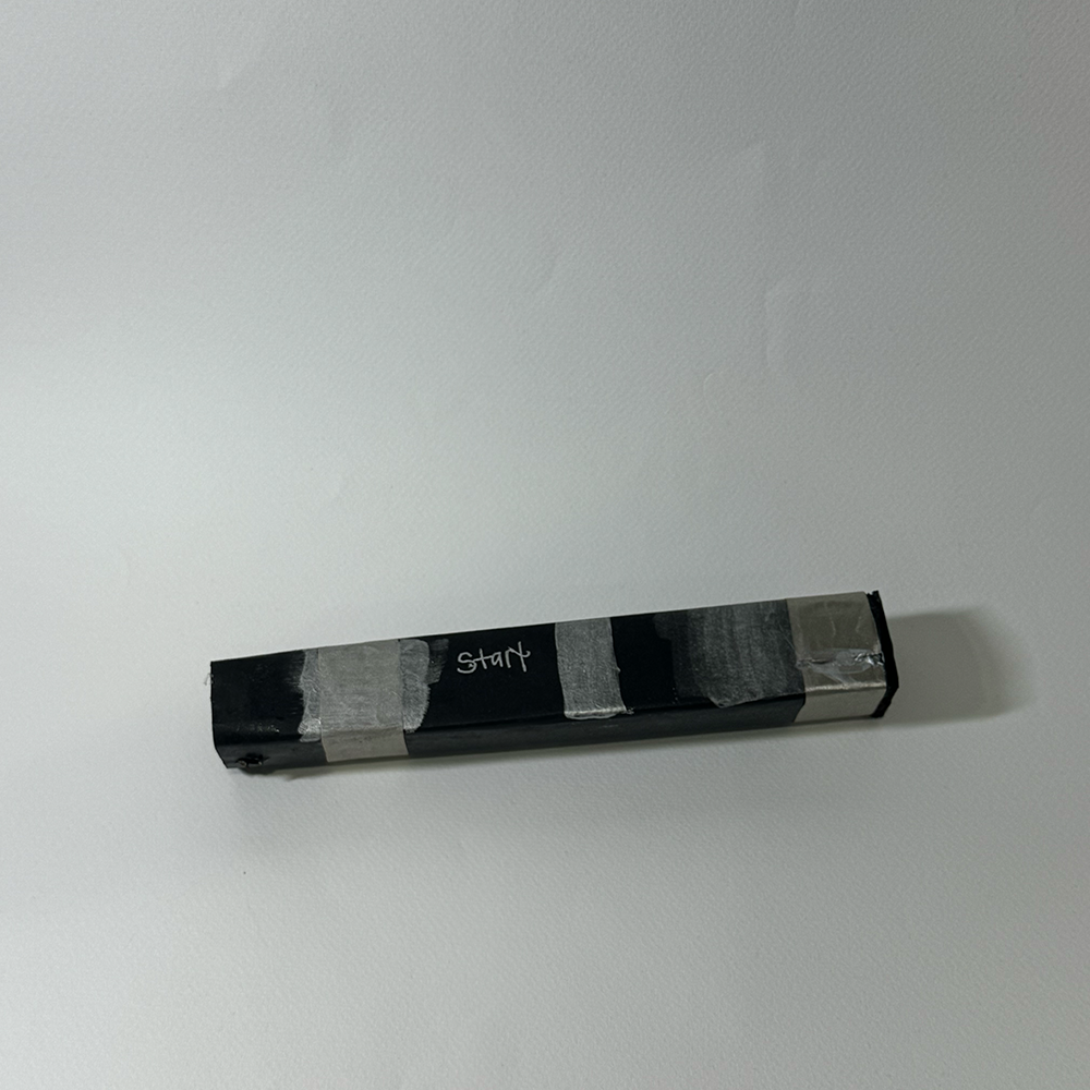 This is an image of my temprorary final stick of my joystick. At first I thought it was the glue ruining my connection and not having separate actions but then I realized I made a rookie mistake. The circuit was closed in three different spots the top, near the bottom, and the rim of the opening.