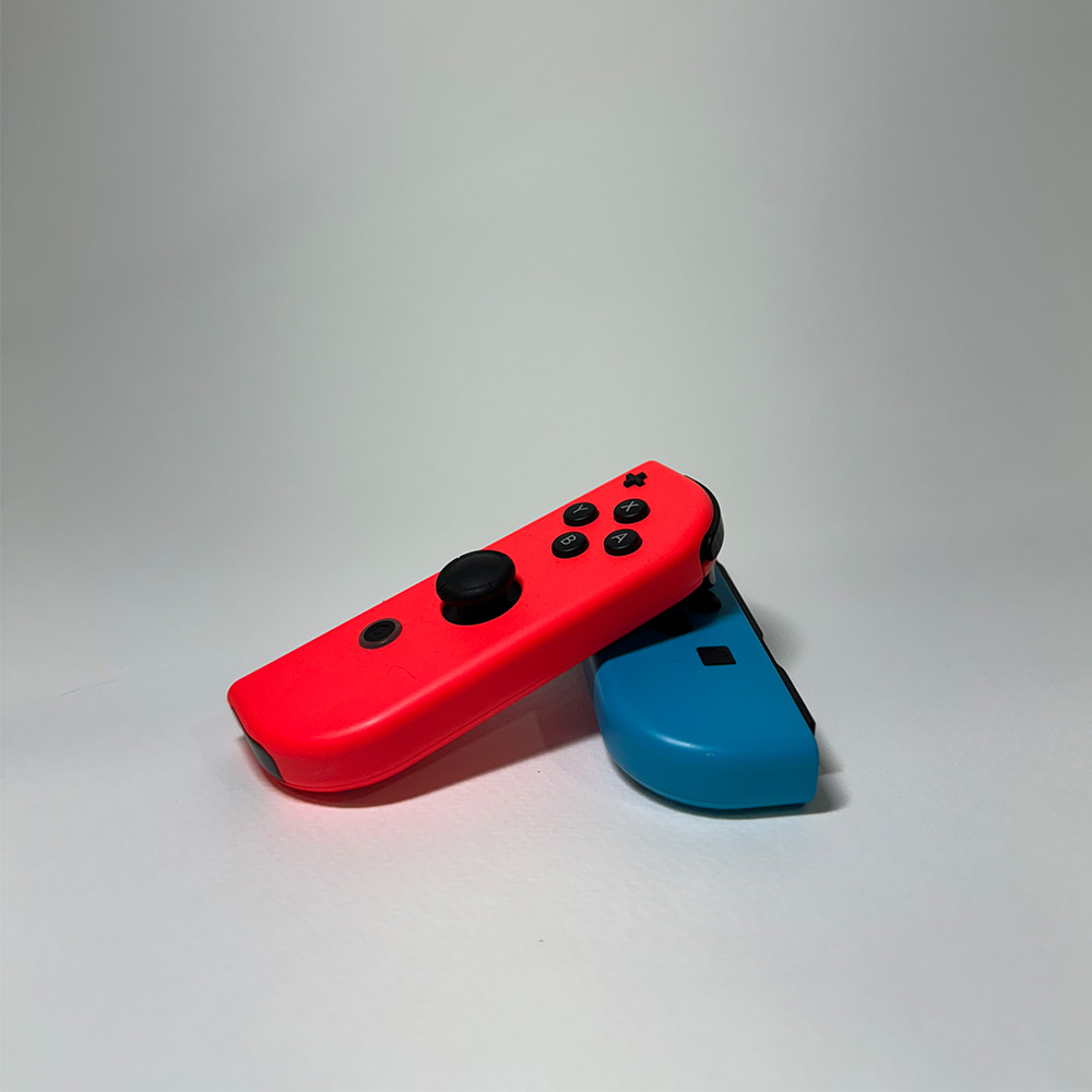 I strated to experiment with more dynamic poses by introducing the other joycon and showing off multiple angles of the controllers.