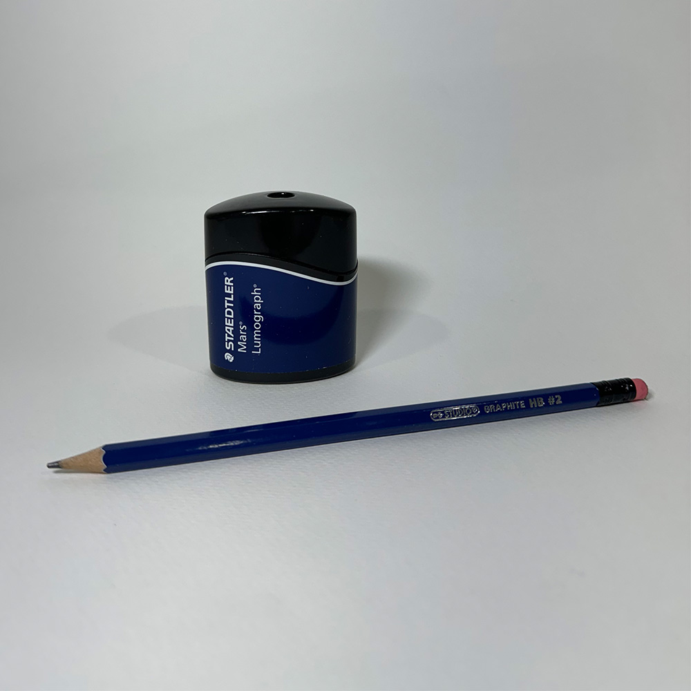  I tried to align the sharpener on one of the corners for the rule of thirds and use the pencil to guide the viewer's eye towards the sharpener.