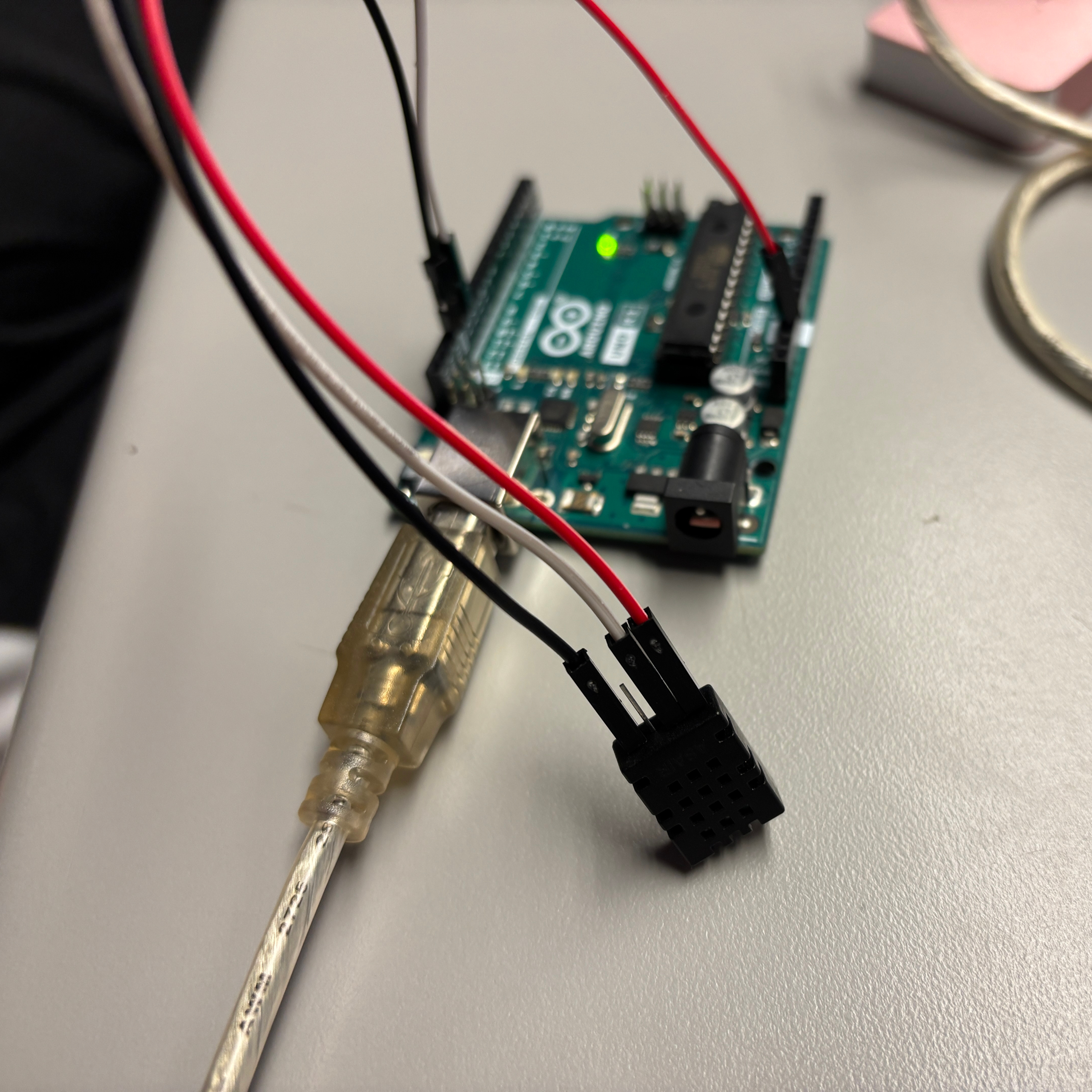 We connected it to our Arduino and uploaded the code we had found and edited previously. It was working but the readings were not accurate to body temperature and although we were physically holding it the values still would not fluctuate much.