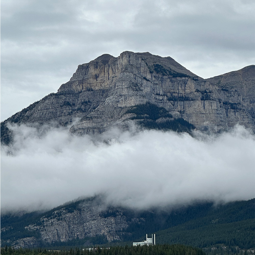 This is a photo of the mountains near Banff from when my family and I went to Calgary, Alberta. We visited the downtown district in Banff and went to the Calgary stampede.
